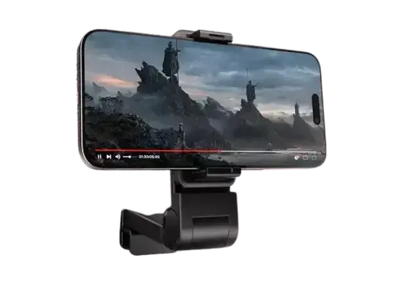A black smartphone is mounted horizontally in a black airplane phone holder, displaying a video on its screen.
